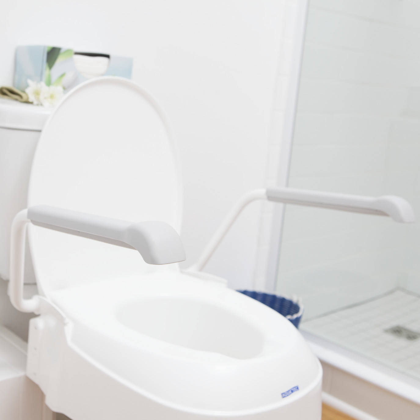 Invacare Raised Toilet Seat with handles The ILC